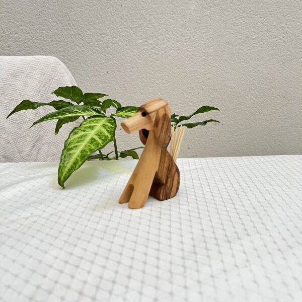 Chien porte cure-dents ou stylo